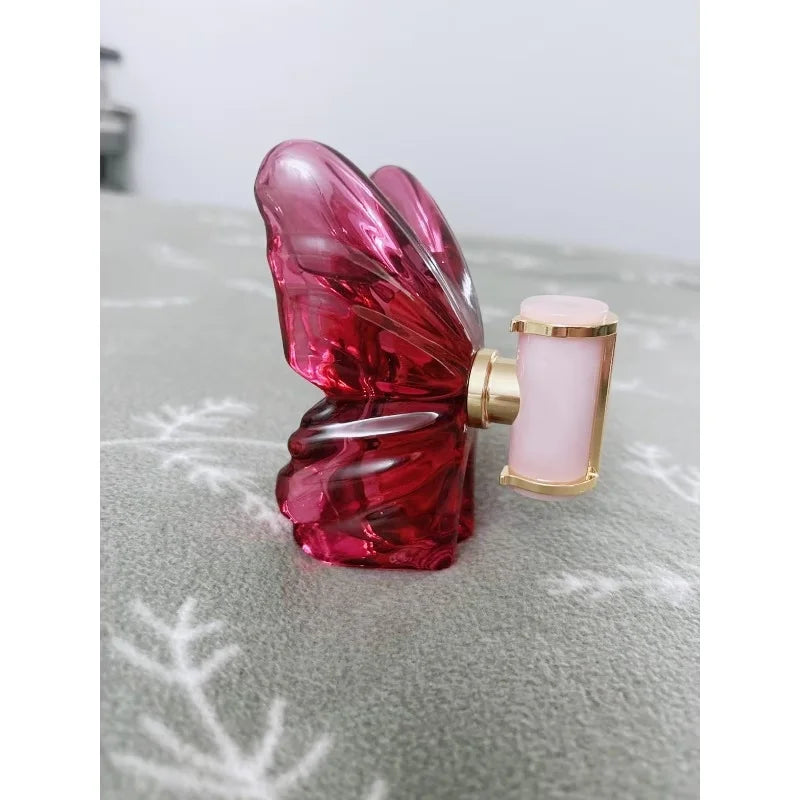 LA Bom. b.A 2.7oz perfume, fresh flower and fruit fragrance, dragon fruit integration, unique butterfly design